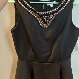 Black Peplum Top with Sequin Detail M